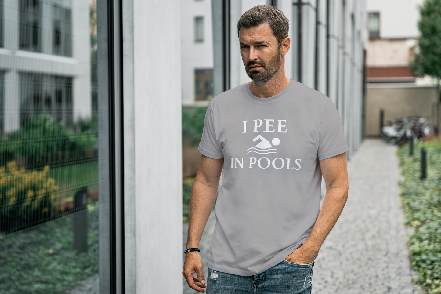 Short sleeve t-shirt. I PEE IN POOLS