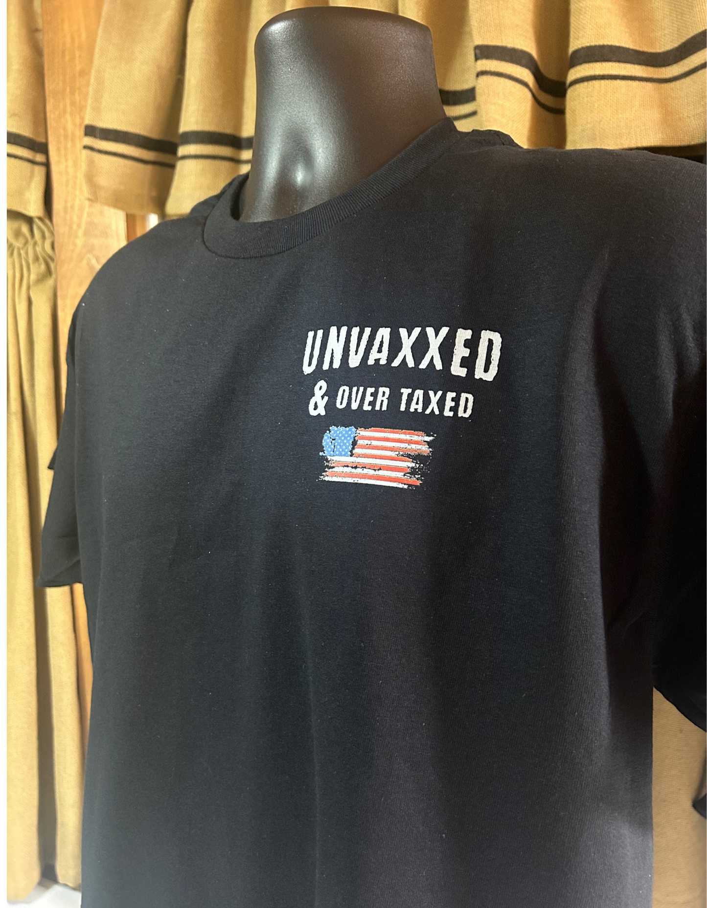 Short sleeve t-shirt. UNVAXXED AND OVER TAXED
